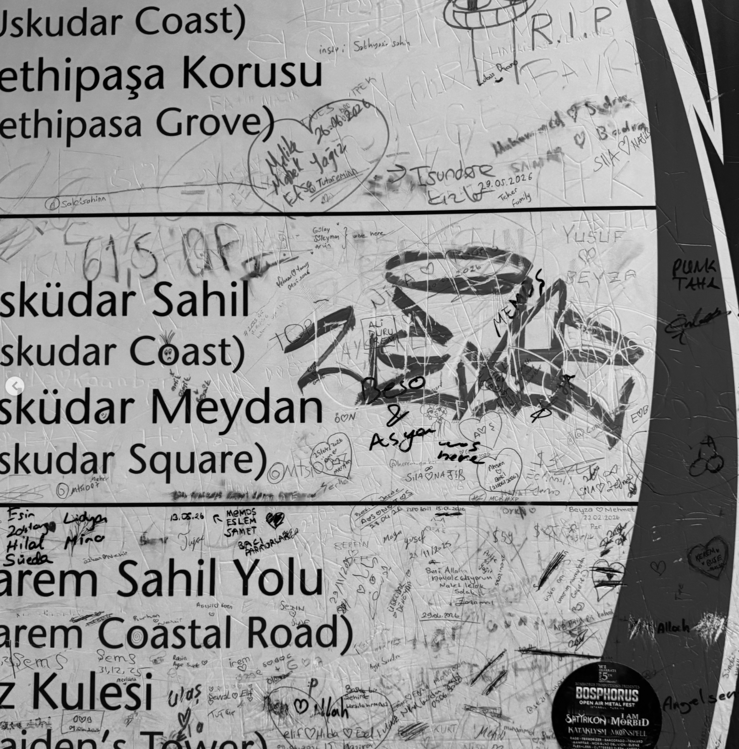 Layered names, route lettering, and handwritten marks across a wall in Üsküdar